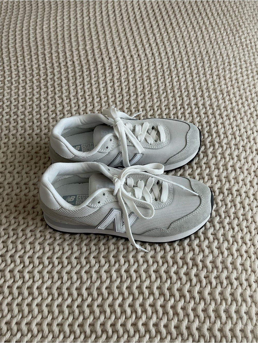 New Balance women’s Grey & White Casual Sneakers